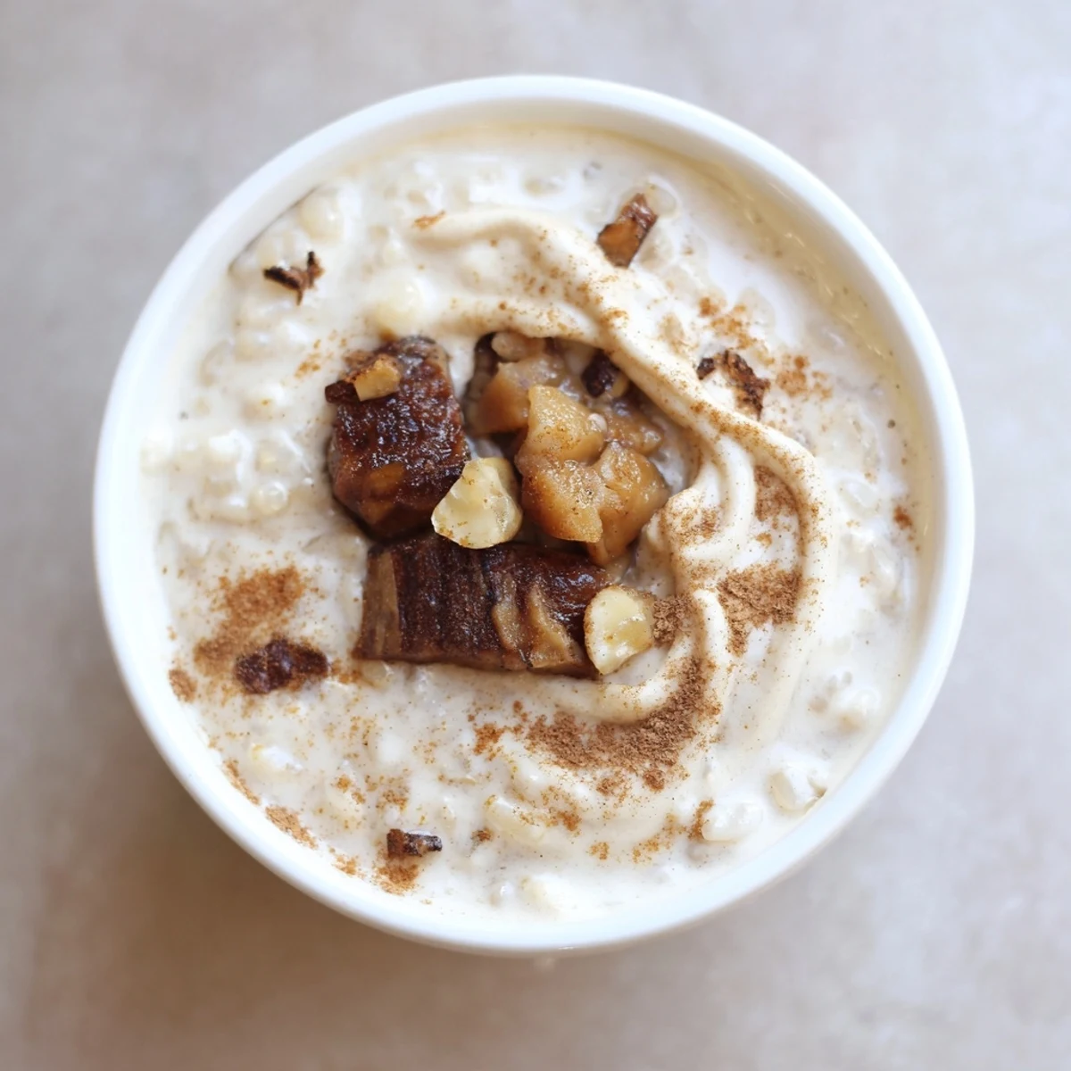 Creamy Japanese rice pudding topped with rich chestnut cream and cinnamon.  