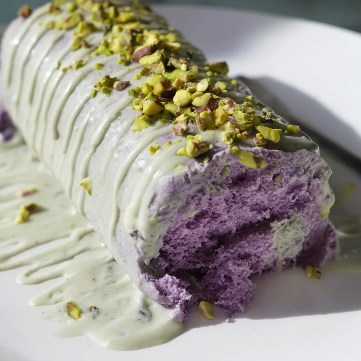 Creamy ube & pistachio ice cream bars, layered for a colorful summer treat.  