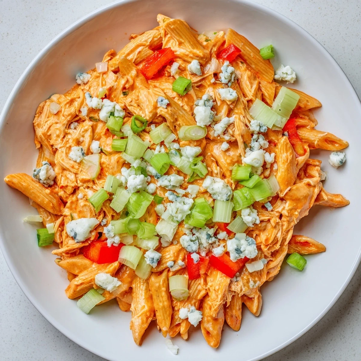 This quick and easy Buffalo Chicken Pasta Skillet shows off tender chicken, pasta, and melty cheese.