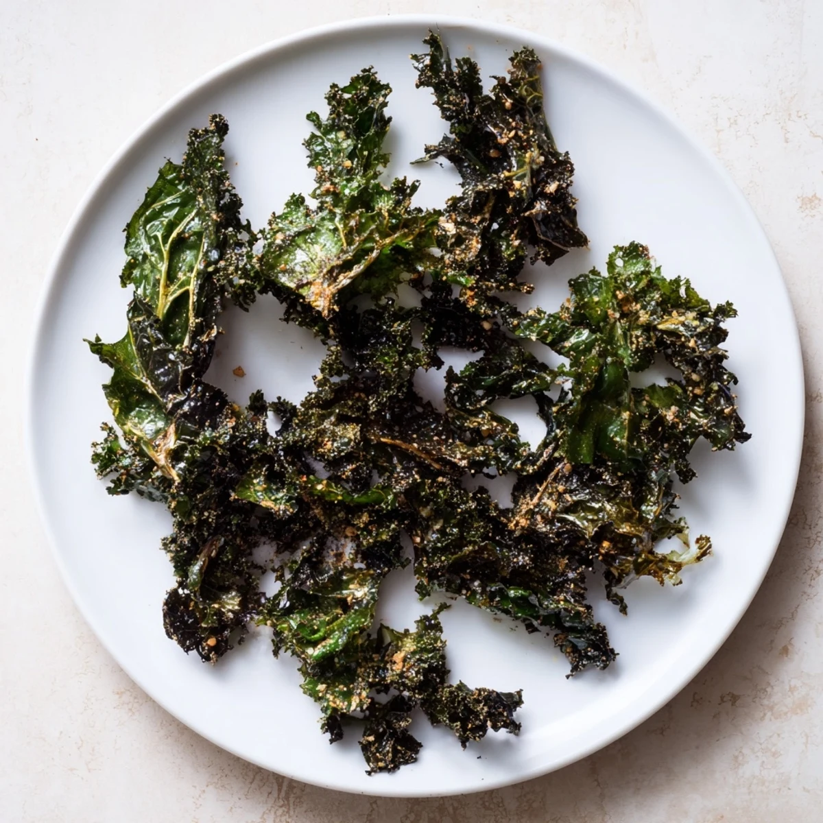 Golden, crunchy baked kale chips, a healthy snack, ready for a satisfying, salty bite.