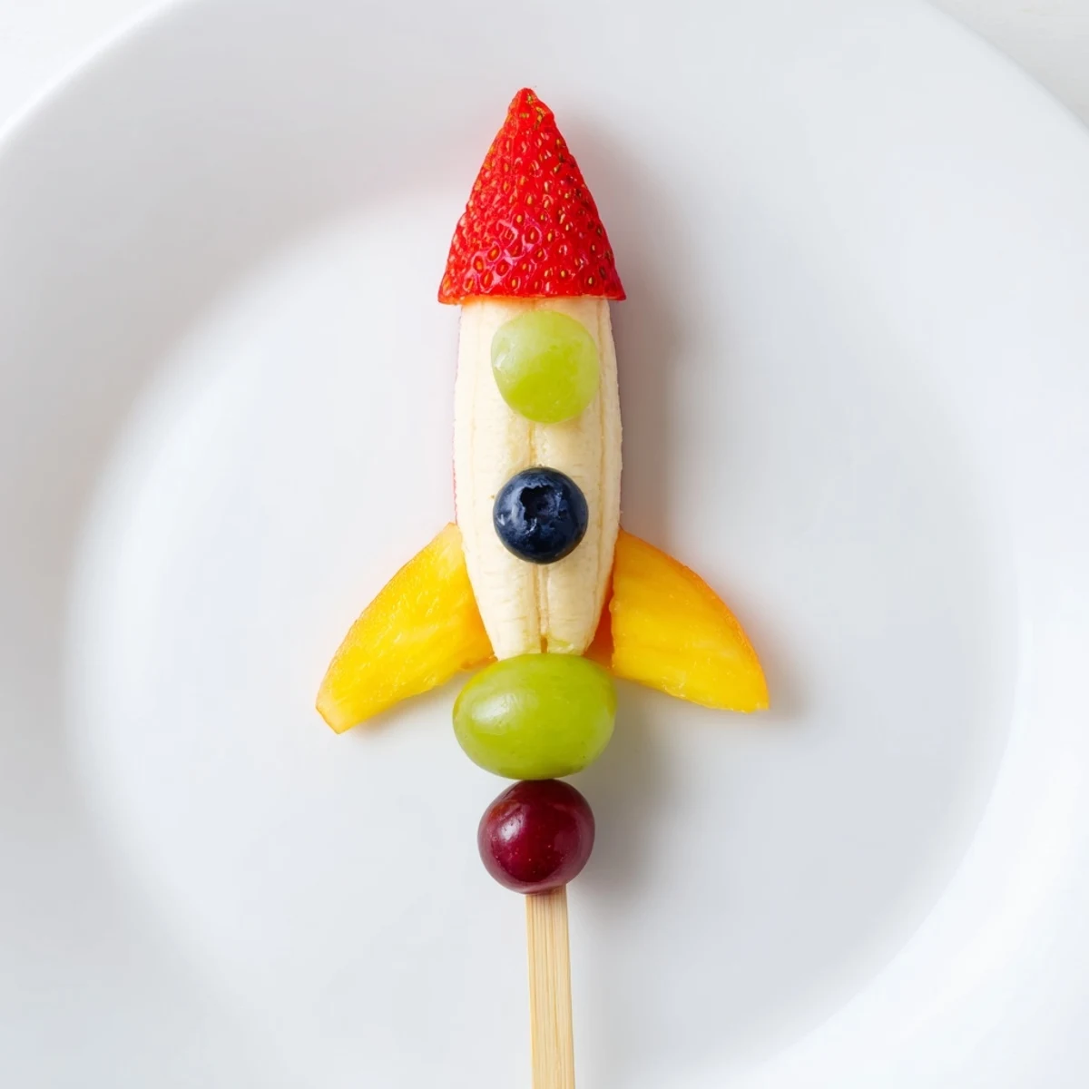 A close-up of delicious Rocket Ship Fruit Skewers ready to be enjoyed as a healthy treat.