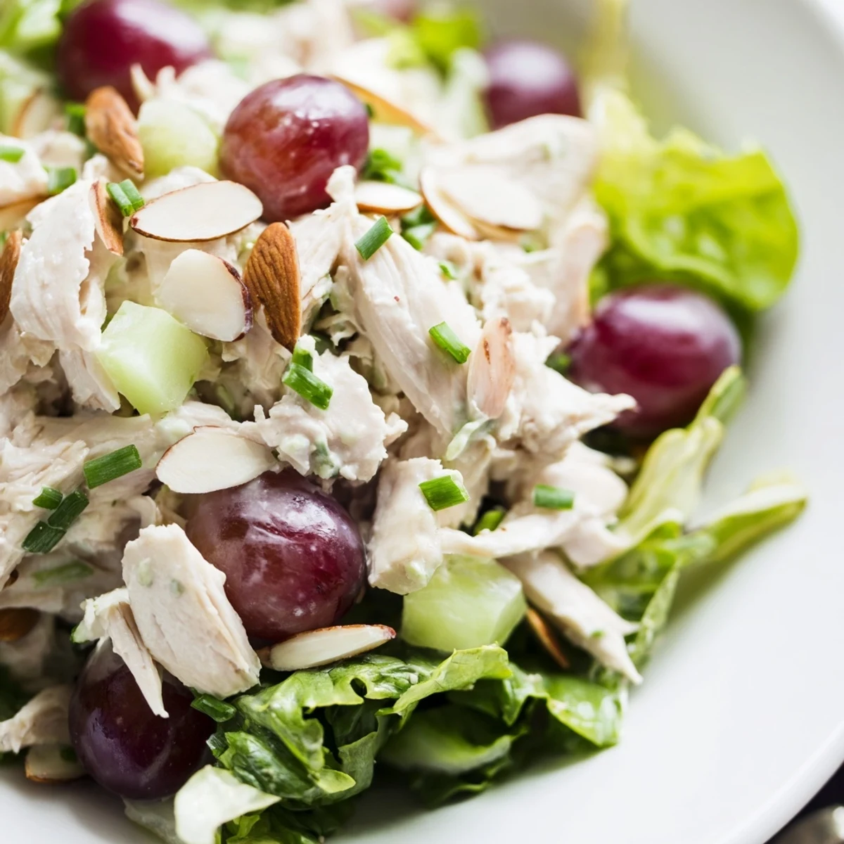 Freshly plated Crispy Chicken Salad featuring shredded chicken and crisp celery.