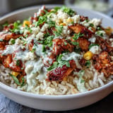 Flavorful Street Corn Chicken Rice Bowls featuring seasoned chicken and charred corn.