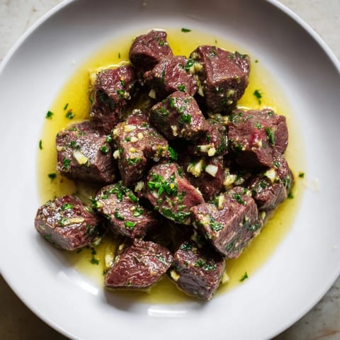 Air-Fryer Garlic-Butter Steak Bites, tender and juicy, tossed in a rich, buttery garlic sauce, ready to eat.