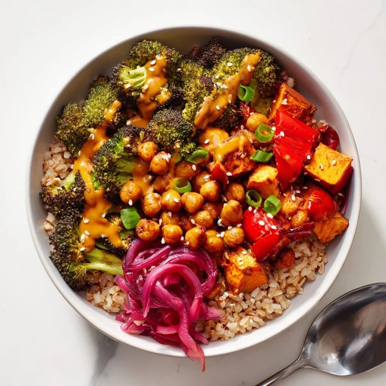 Deliciously vibrant grain bowls featuring roasted vegetables with gochujang-maple sauce.