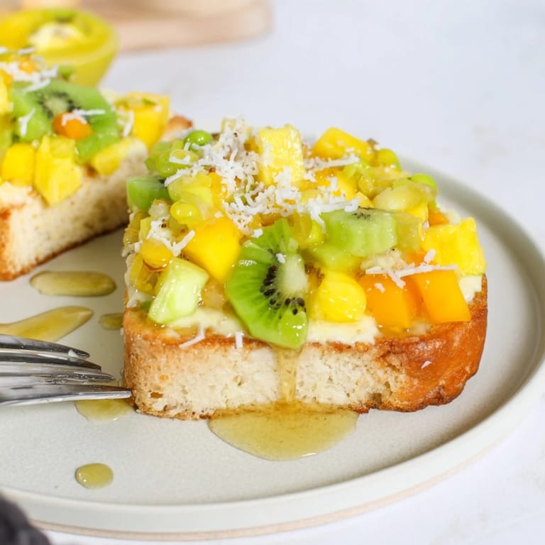 Deliciously baked Yogurt-Custard Toast with fresh pineapple and coconut flakes.  