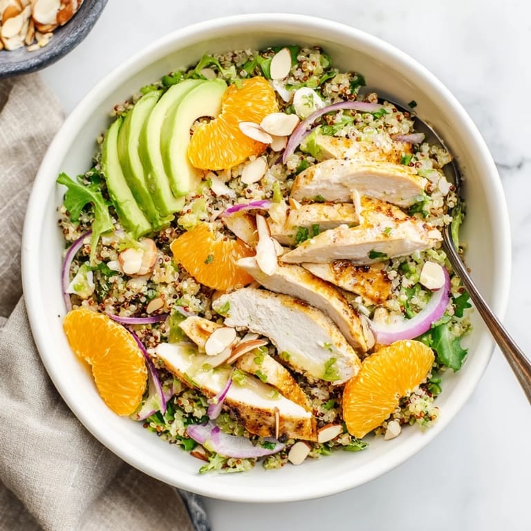 Juicy orange segments and creamy avocado add brightness to this wholesome, gluten-free salad bowl for a healthy meal.